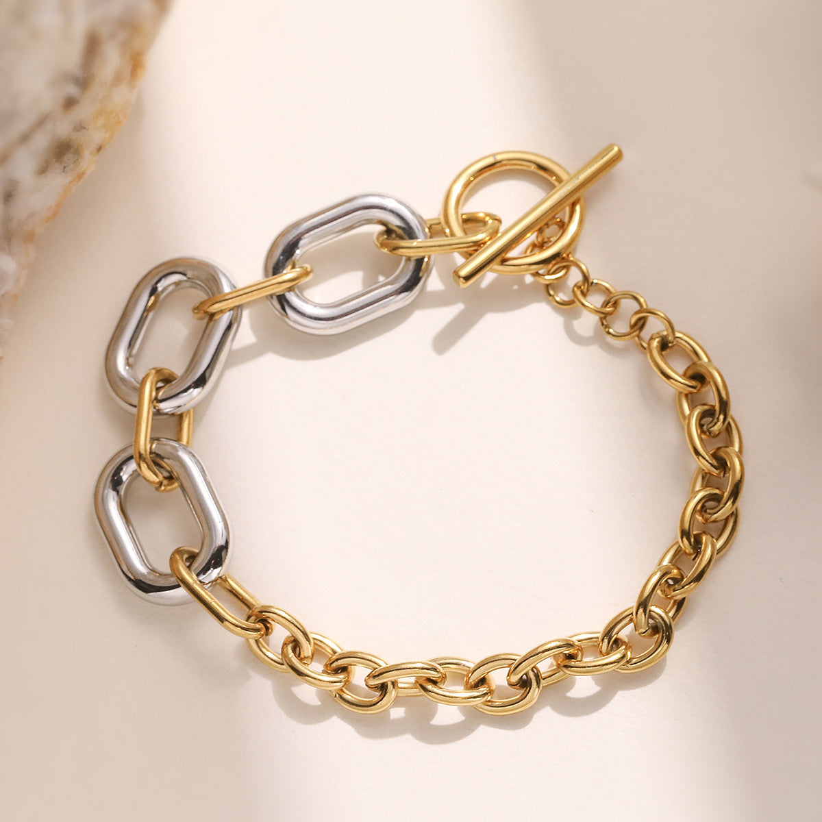 Pulsera dorado y plateado eslabon