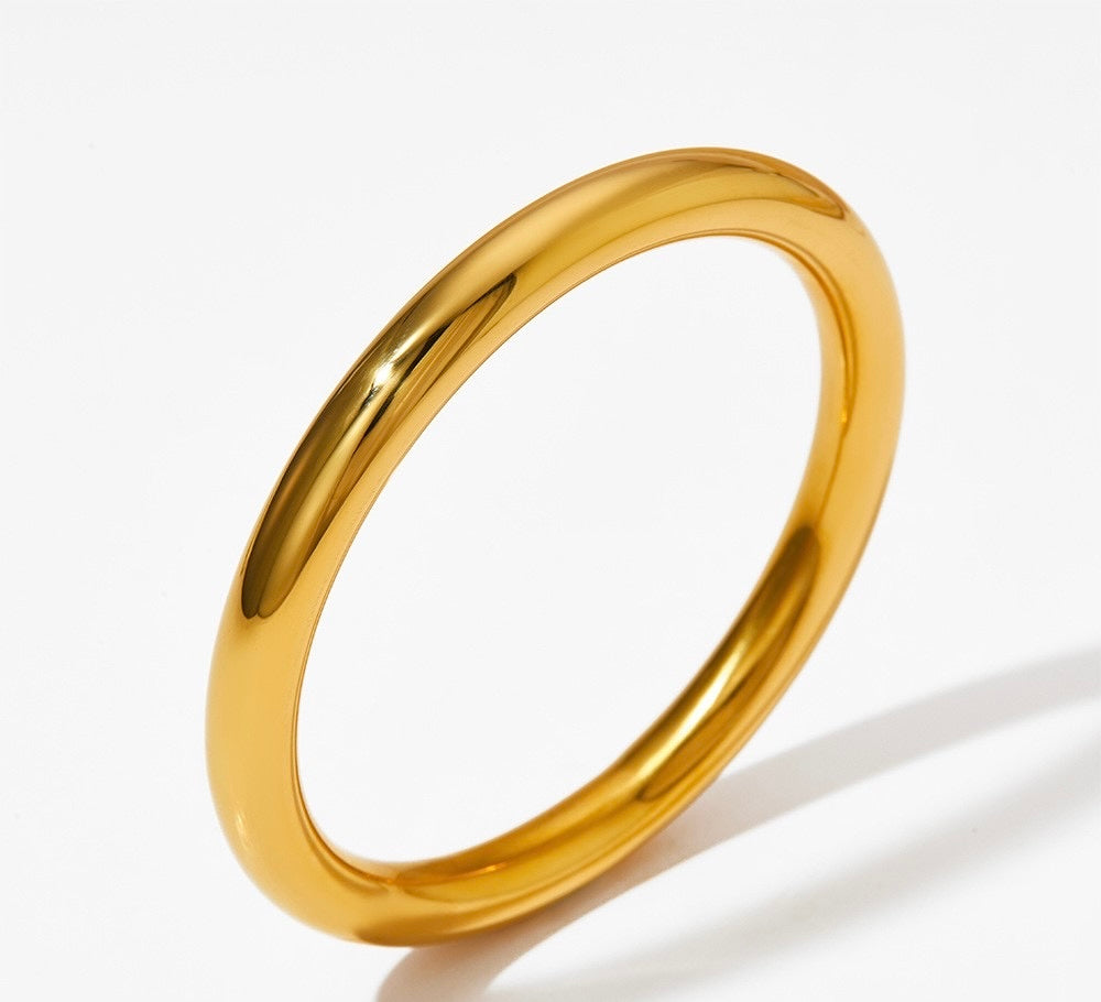 Pulsera dorada rígida