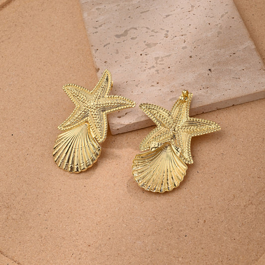 Aretes dorados estrella y concha