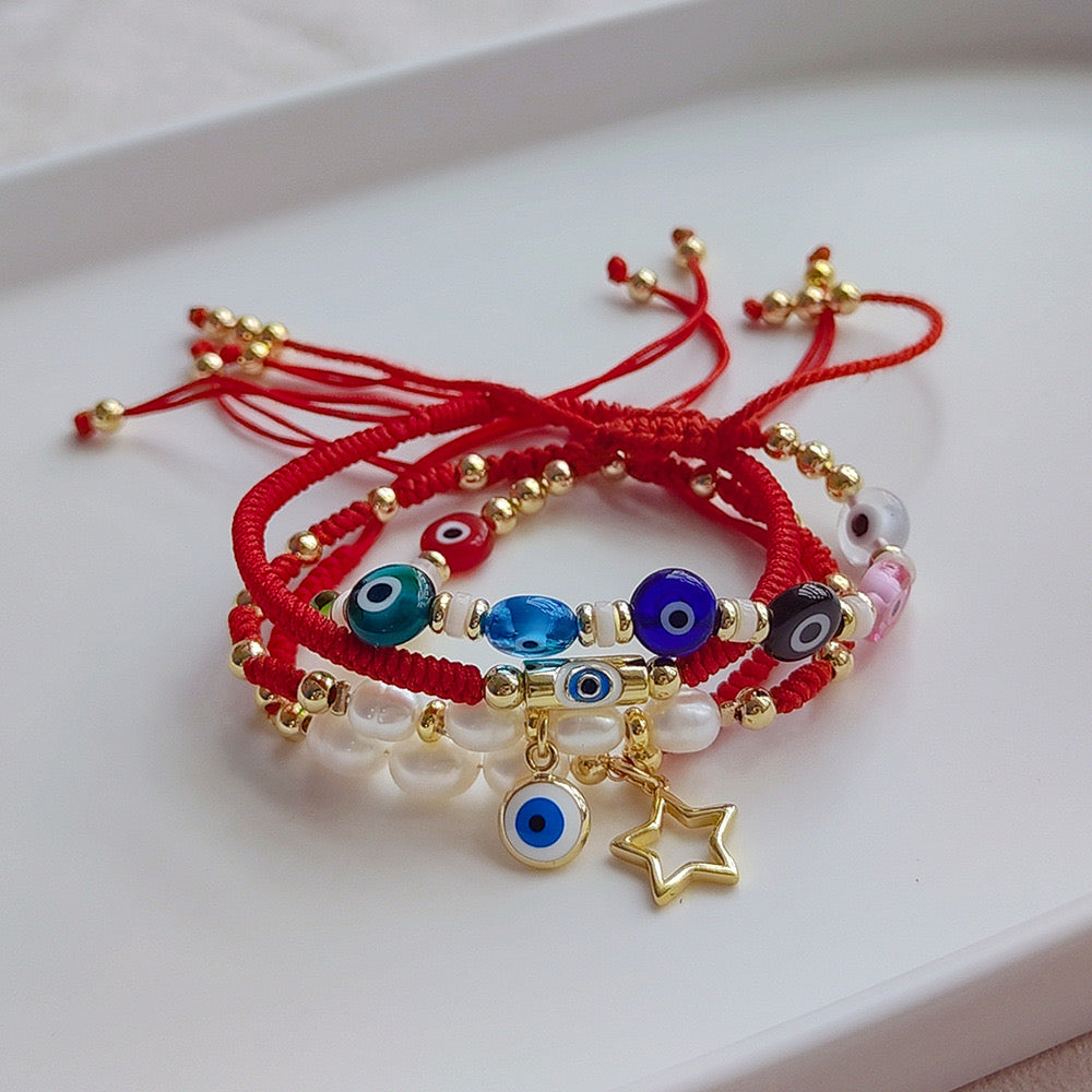 Set pulseras hilo rojo