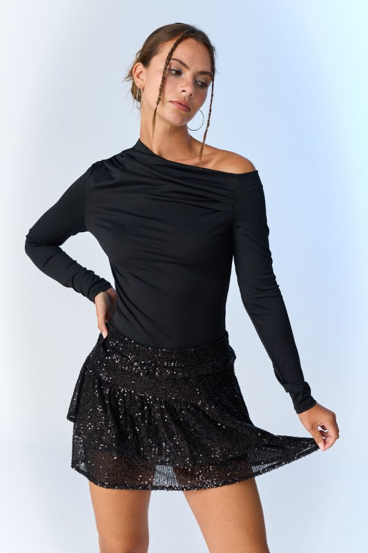 Blusa asimétrica negra