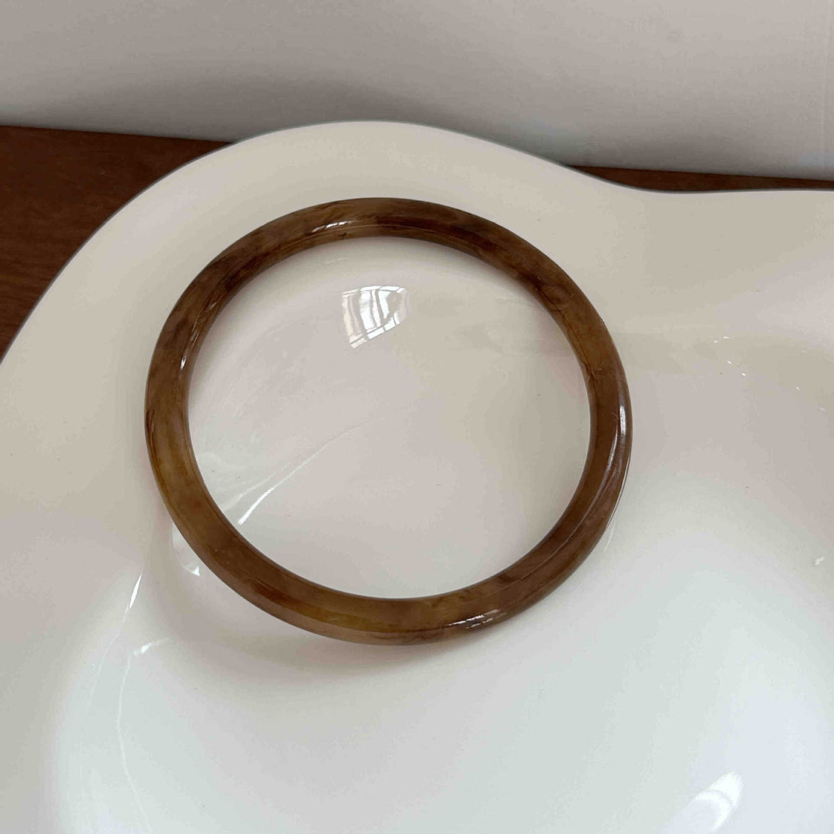 Brazalete café delgado