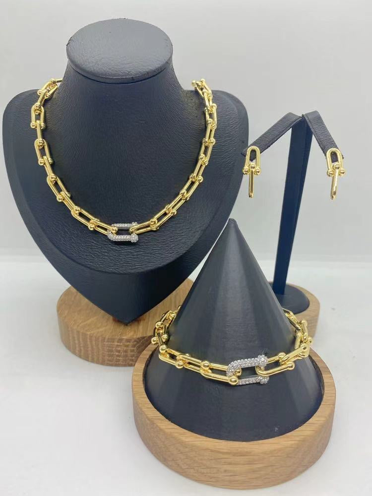 Pulsera dorado con plata