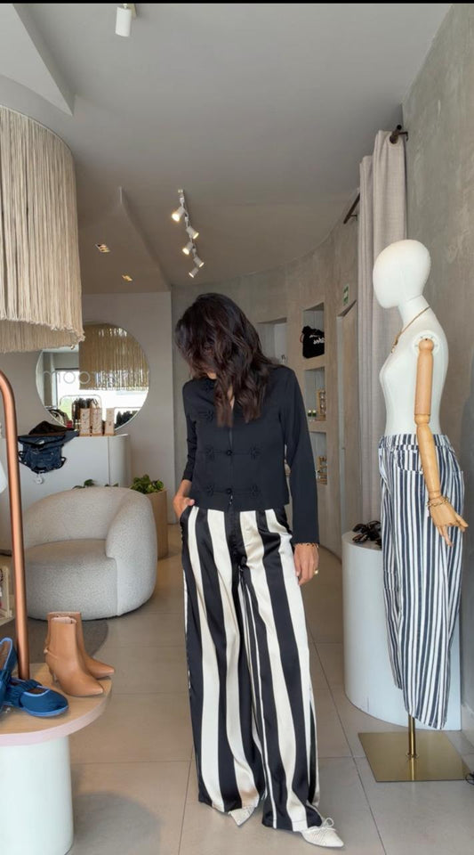 Pantalón rayado negro con beige