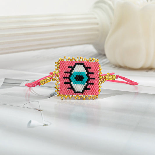 Pulsera ojo rosa