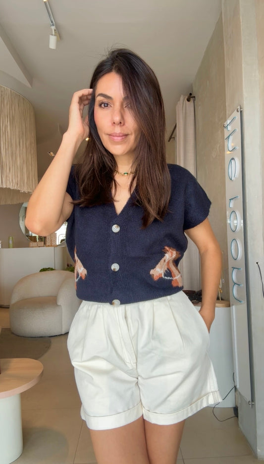 Chaleco azul caballos