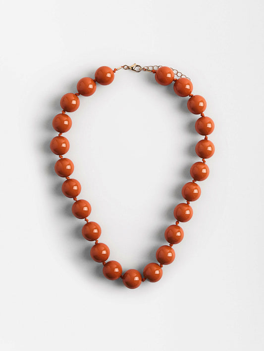 Collar bolitas naranja