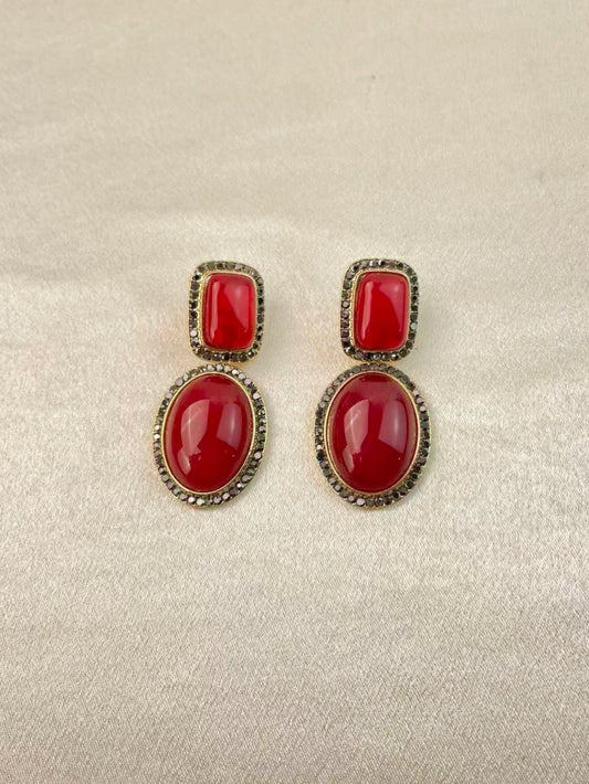 Aretes rojos
