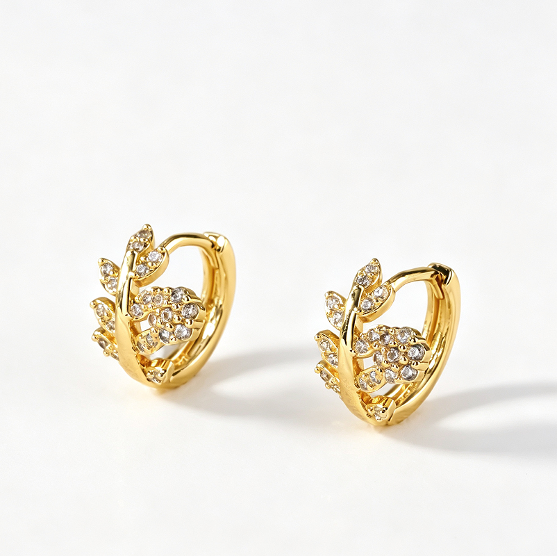 Arracada hojas brillantes con flor
