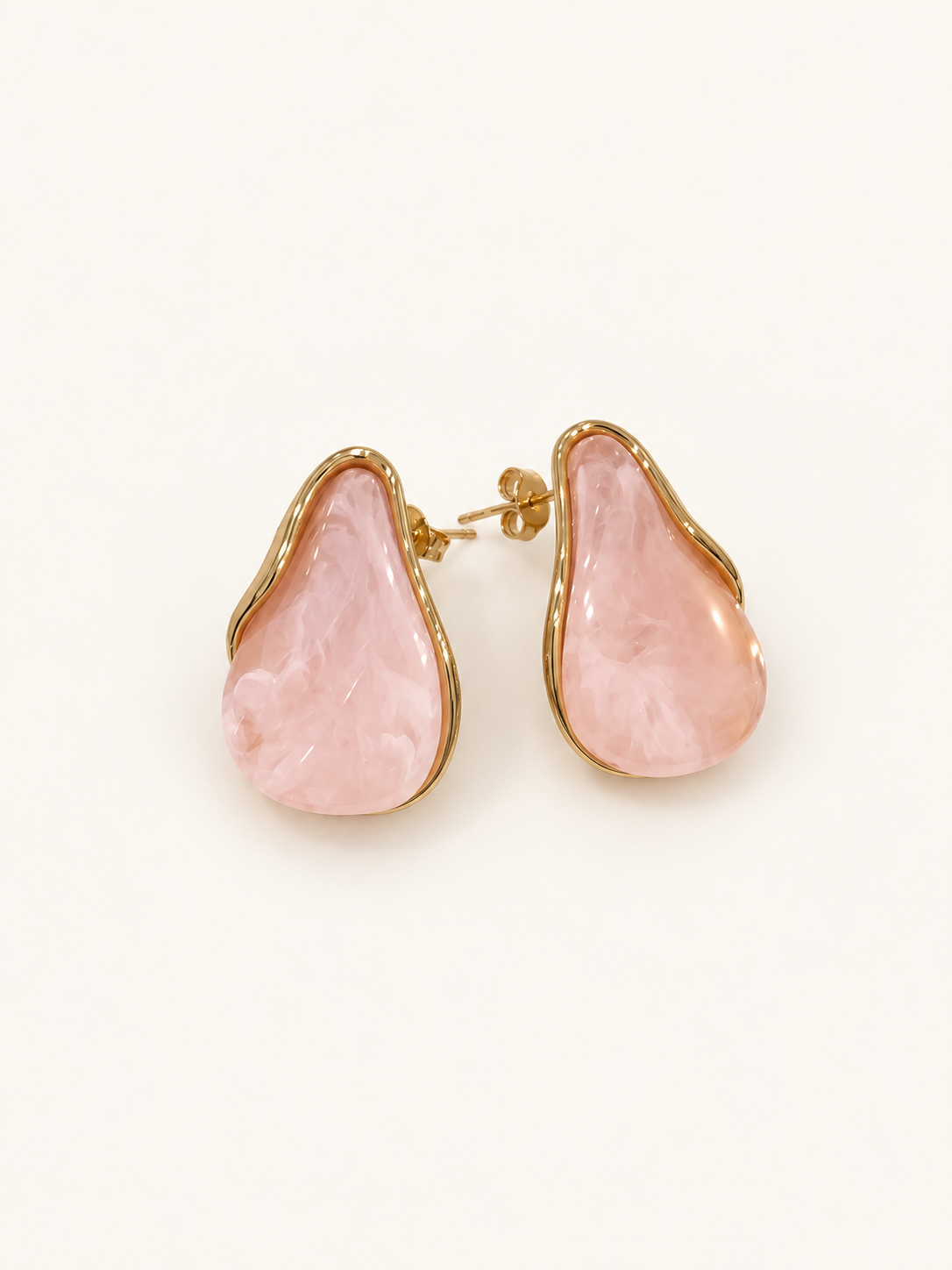 Aretes piedra rosa asimetrica