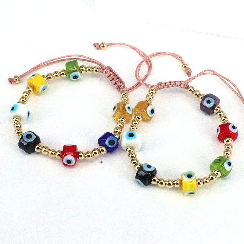 Pulsera ojitos de colores