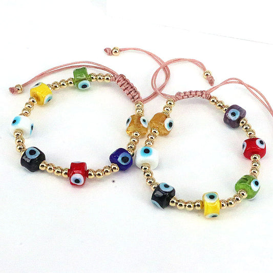 Pulsera ojitos de colores