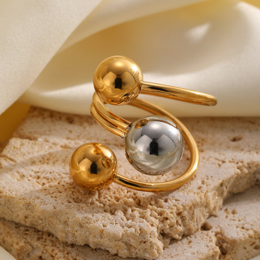 Anillo bolitas dorado con plata