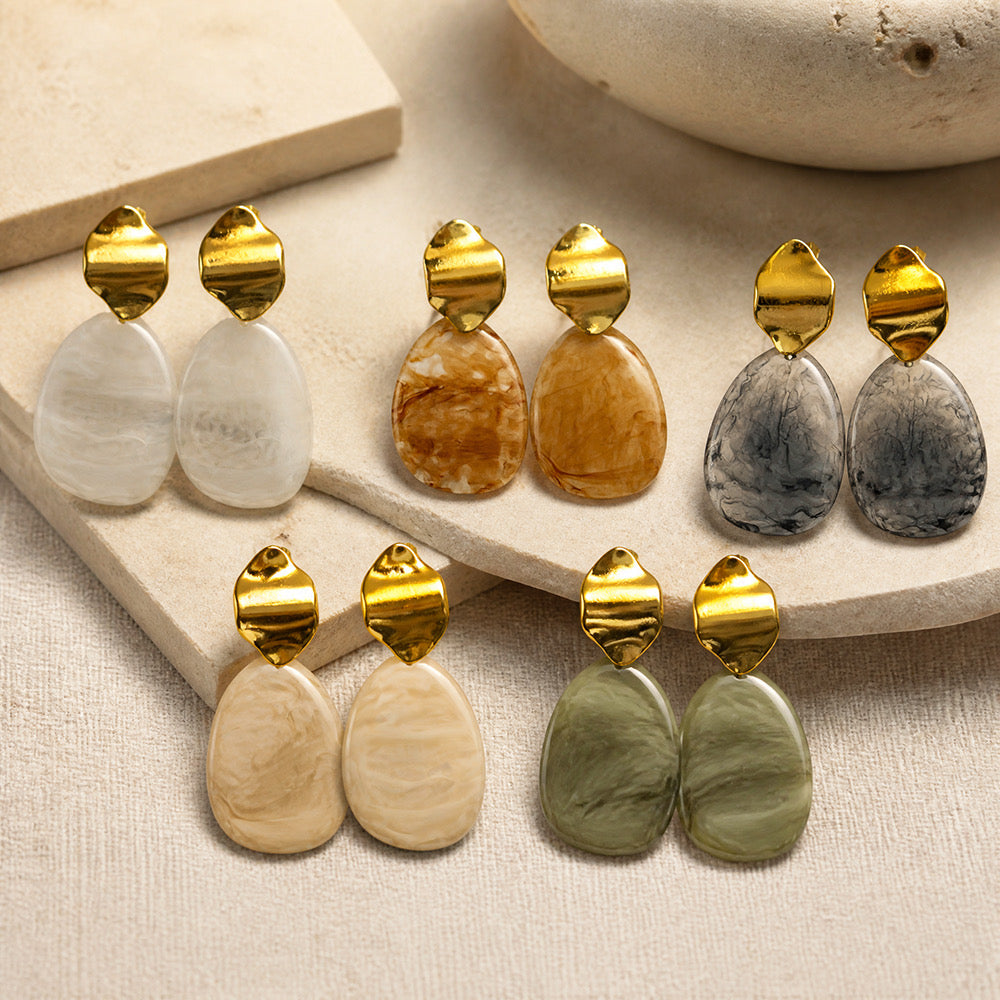Aretes dorados con piedra
