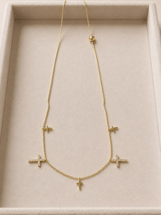Collar dorado cruces