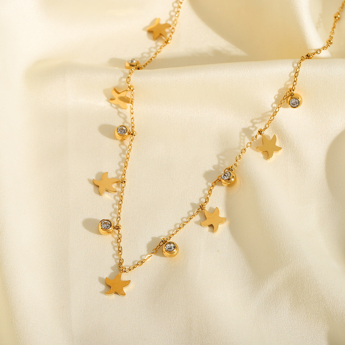 Collar estrellas y brillitos