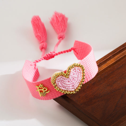 Pulsera hilo rosa corazón