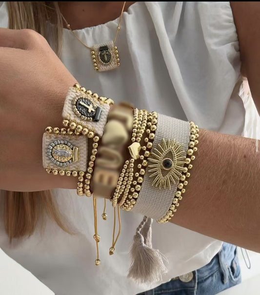 Pulsera hilo ojo gris