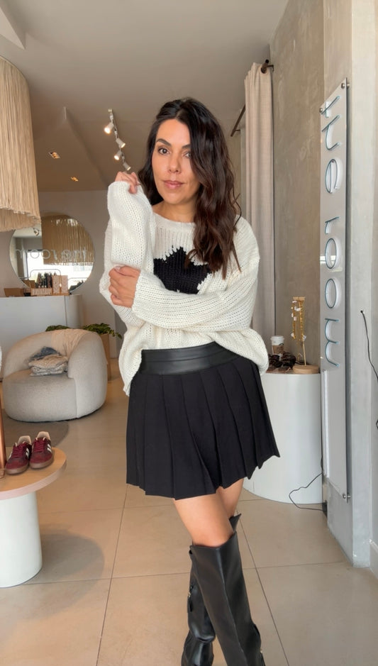 Falda corta tableada negra