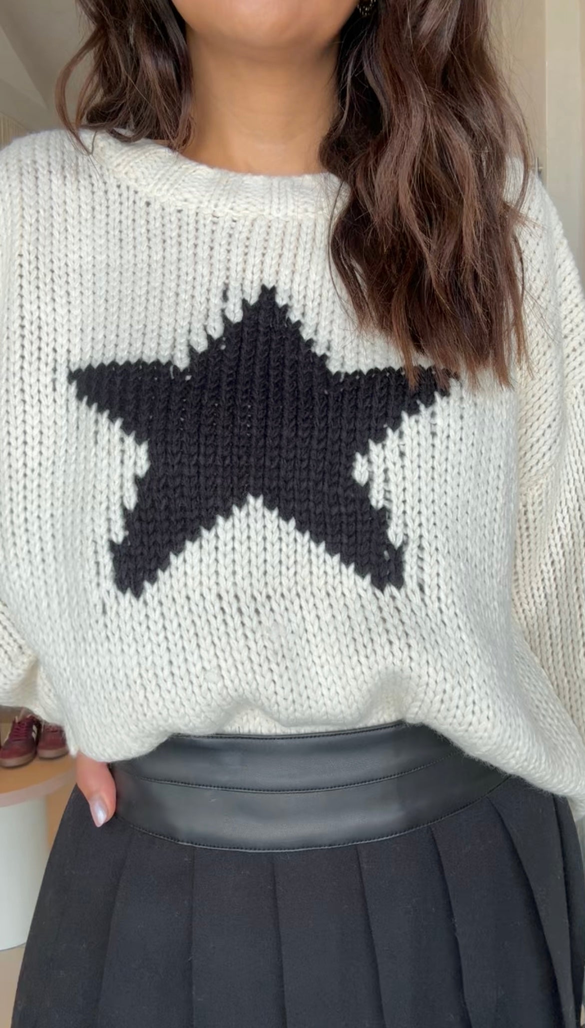 Suéter estrella negra