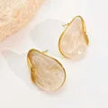 Aretes piedra blanca asimetrica